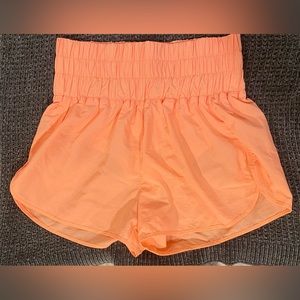 Neon orange windbreaker shorts with a smocked waist size large